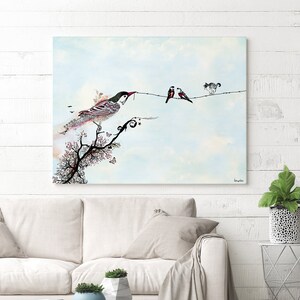 May include: A watercolor painting of a bird perched on a branch with three other birds on a wire in the background. The sky is a light blue with white clouds. The bird on the branch is a light pink and gray with a long tail. The birds on the wire are black and white.