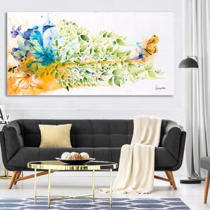 Abstract watercolor painting of a butterfly with blue, green, and yellow colors. The butterfly is surrounded by leaves and flowers.