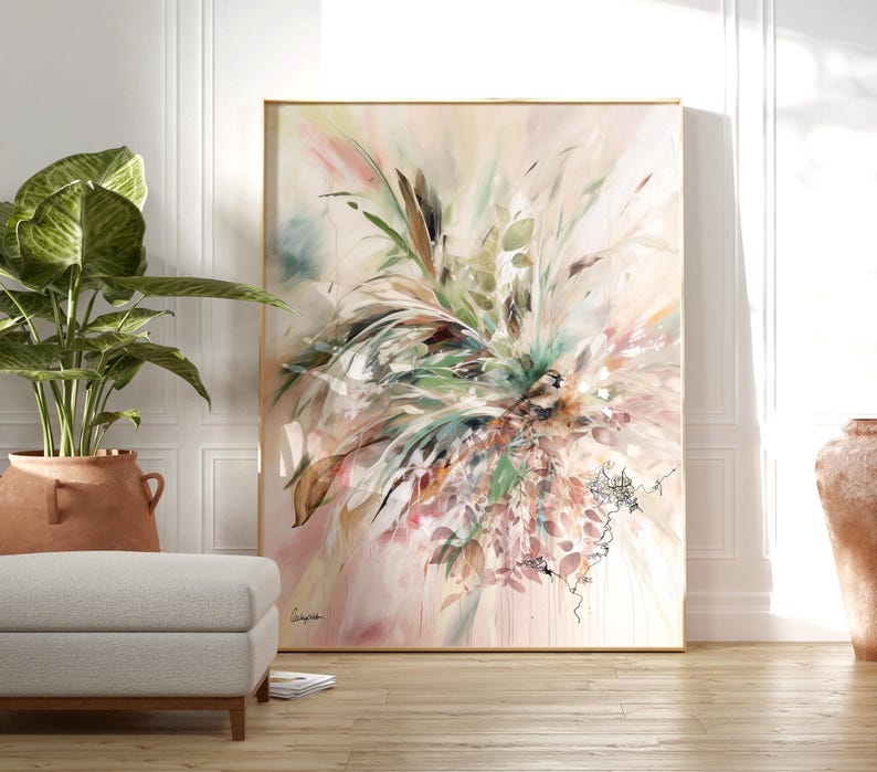 Large abstract painting in a gold frame. The artwork features a blend of green, pink, and brown brushstrokes, creating a floral or botanical theme. The painting is displayed in a well-lit room with a neutral color palette.
