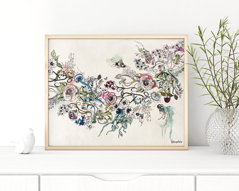 May include: A framed watercolor artwork featuring a floral design with roses, leaves, and abstract elements in shades of pink, blue, and purple. The artwork is in a gold frame and signed in the lower right corner.