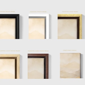 May include: Six options for wall art display: a floating black frame, a floating white frame, a floating gold frame, a floating light wood frame, a floating dark wood frame, and a stretched canvas, all featuring a beige watercolour mountain landscape.