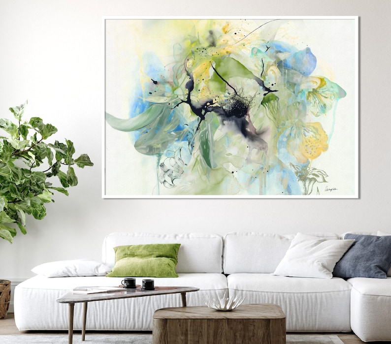 Abstract watercolor painting featuring a blend of blue, green, and yellow hues. The artwork depicts a floral motif with delicate brushstrokes and a sense of movement.