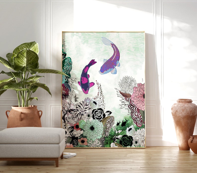 May include: A rectangular wall art print featuring two koi fish swimming in a light green water background above a dense arrangement of black, white, and pink floral illustrations. The artwork is framed in a thin gold border and displays intricate patterns.