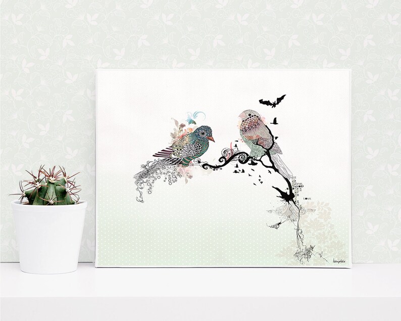 A whimsical art print featuring two stylized birds perched on a branch with intricate details. The birds are a mix of blue, green, and brown, and the branch is adorned with black and white swirls. The background is a light green with a subtle pattern.