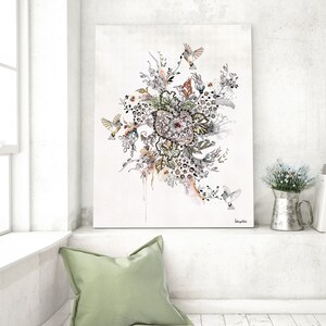 A black and white illustration of a floral arrangement with birds. The flowers are in shades of green, yellow, and pink. The birds are in shades of blue and gray. The illustration is on a white background. The artist's signature is in the bottom right corner.
