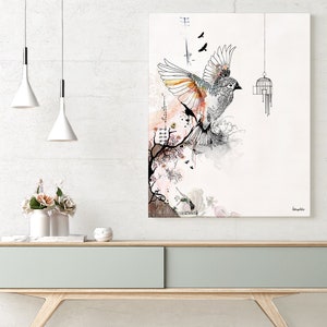 May include: A watercolor painting of a bird with outstretched wings, flying out of a cage. The bird is black and white with orange accents. The background is a soft pink and white watercolor wash with a floral design. The painting is titled "longevity".