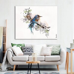 A watercolor painting of a blue bird perched on a branch with delicate white flowers. The background is a soft white with hints of pink and green.