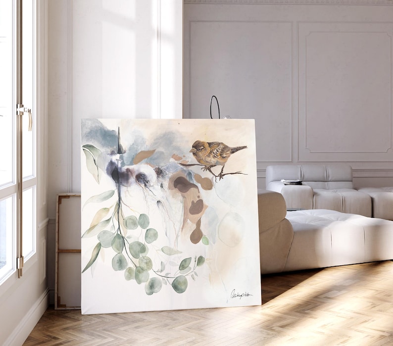 Large watercolor painting featuring muted greens, browns, and blues. The artwork depicts a bird perched on a branch with eucalyptus leaves, set against a soft, abstract background. The painting has a serene and nature-inspired theme, suitable for home or office decor.  The artist's signature is subtly placed in the bottom right corner.