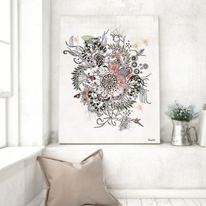 A black and white floral illustration with pink accents on a white background. The illustration is framed and hanging on a white wall above a white shelf with a pillow and a metal pitcher with white flowers.