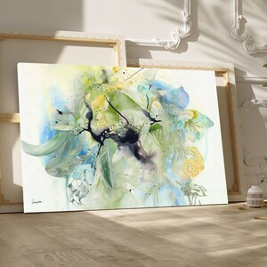 Abstract watercolor painting with shades of blue, green, and yellow. The painting features a large, central flower-like shape with swirling, organic lines and shapes.