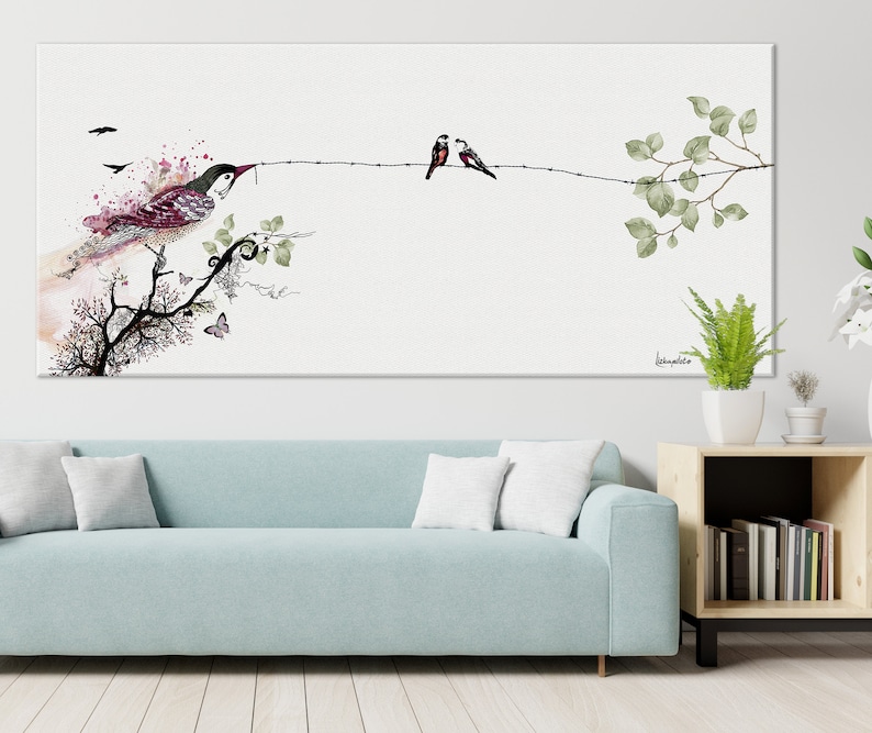 watercolor painting of a bird perched on a branch with two other birds on a wire. The painting has a white background with pink and green watercolor accents.