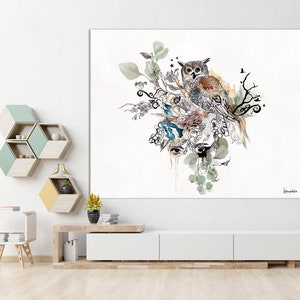 A watercolor painting of an owl perched on a branch with green leaves and other botanical elements. The owl is brown and gray with yellow eyes. The painting is on a white background and has a signature in the bottom right corner.