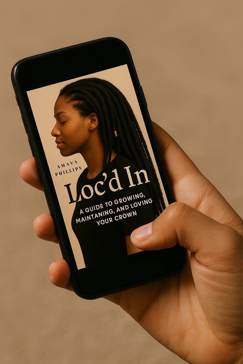 May include: A smartphone screen shows the book cover of "Loc'd In" by Amava Phillips. The cover features a side profile of a person with locs. The book's subtitle reads: "A guide to growing, maintaining, and loving your crown."