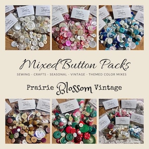 May include: A collection of clear plastic bags filled with assorted buttons in various colors, shapes, and sizes. Each bag features a Prairie Blossom Vintage label. The text Mixed Button Packs, Sewing, Crafts, Seasonal, Vintage, Themed Color Mixes is visible.