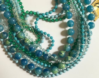 Long multistranded Coro glass bead necklace in greens and blues - 48 inches long