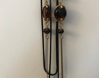 Elegant vintage long necklace with accent tortoiseshell glass beads and slim black and gold chains