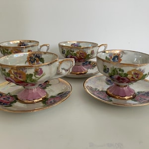 Four vintage Japanese lusterware teacups and saucers from the 1950s