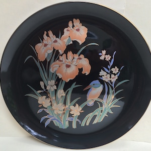 An absolutely beautiful antique Japanese ceramic plate - black with peach-colored irises - 10.75 x 1 in