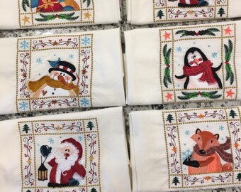Juego de 5 toallas de cocina con personajes retozando en la nieve