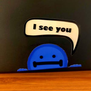 Set di adesivi con faccine sorridenti che sbirciano: divertenti decalcomanie per laptop