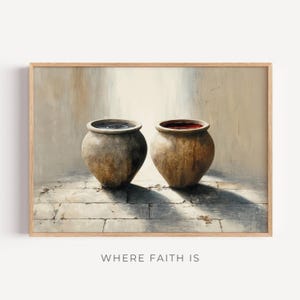 May include: A framed print featuring two antique earthenware pots, one with dark liquid and the other with red liquid. The pots are set against a neutral-toned wall and a stone floor. The text "WHERE FAITH IS" is at the bottom.