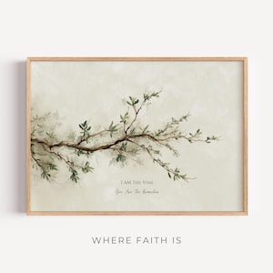 May include: A framed art print featuring a watercolor illustration of a tree branch with green leaves. The artwork includes the text "I AM THE VINE, You Are The Branches" and the words "WHERE FAITH IS" at the bottom.
