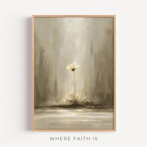 Pode incluir: Uma impressão de arte emoldurada com uma única margarida branca com um centro amarelo, contra um fundo suave e neutro. A obra de arte tem um estilo pictórico com foco na luz e na sombra. O texto "WHERE FAITH IS" está na parte inferior.