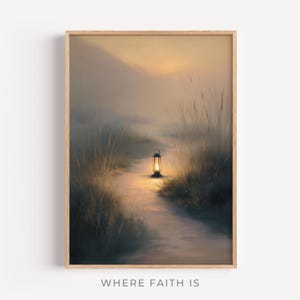 May include: A framed print depicting a tranquil landscape with a lantern-lit path. The path is flanked by tall grass, leading to a misty background with a warm, golden glow. The text "WHERE FAITH IS" is at the bottom of the print.