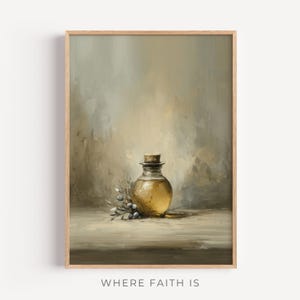 May include: A framed art print featuring a still life of a glass bottle with a cork stopper, filled with a golden liquid. The bottle is accompanied by sprigs of leaves and berries. The words "WHERE FAITH IS" are printed at the bottom.