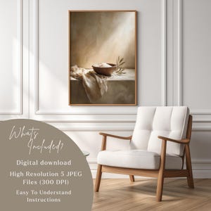 May include: A framed digital art print featuring a still life composition. The artwork depicts a wooden bowl with a white substance, a draped cloth, and an olive branch. The frame is a warm brown color. The text "Whats Included?" is visible.