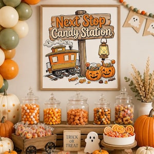 May include: A framed wall sign featuring a cartoon train, a lantern, and two jack-o'-lanterns filled with candy, with the text Next Stop Candy Station. Below, a wooden display holds glass jars of candy, a small wagon, and a Trick or Treat sign.