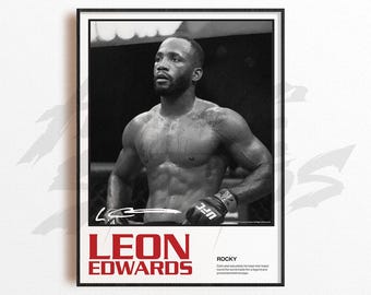 May include: Black and white framed print featuring a muscular man in a UFC glove. The print has the name "LEON EDWARDS" in red block letters. The print also includes the word "ROCKY" and a quote.