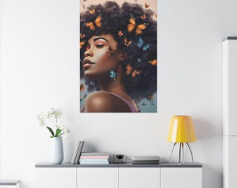 May include: A portrait of a person with dark skin and curly hair adorned with orange and blue butterflies. The person is looking to the left, with a soft pink top. The background is a light, neutral color.