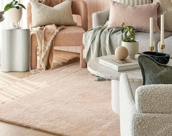 Alfombra de lana neozelandesa anudada a mano, color beige liso, estilo minimalista.