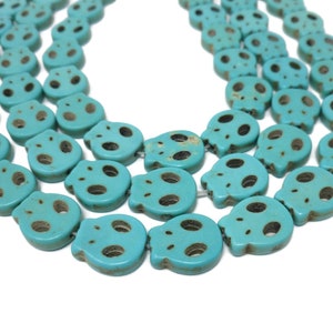 Blue Howlite Flat Skull Bead - 15mm by 13mm by 4mm - 28 beads - synthetic turquoise skulls - Whole Strand