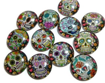 Sugar Skull Glass Cabochon Twelve Piece Set - Mixed Pattern - 16mm by 5mm - 12 Design Set - Dia de los Muertos - for jewelry or magnets
