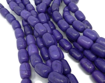 D4 Strand of 24 Black Synthetic Howlite 16mm Cross Shaped Beads