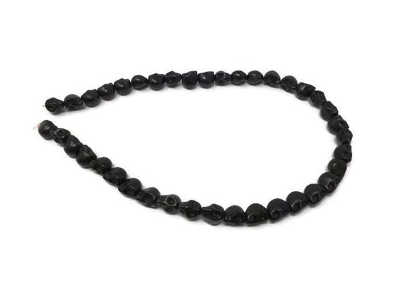 1 x Strand Synthetic Howlite Black Skull Beads 49 Pieces