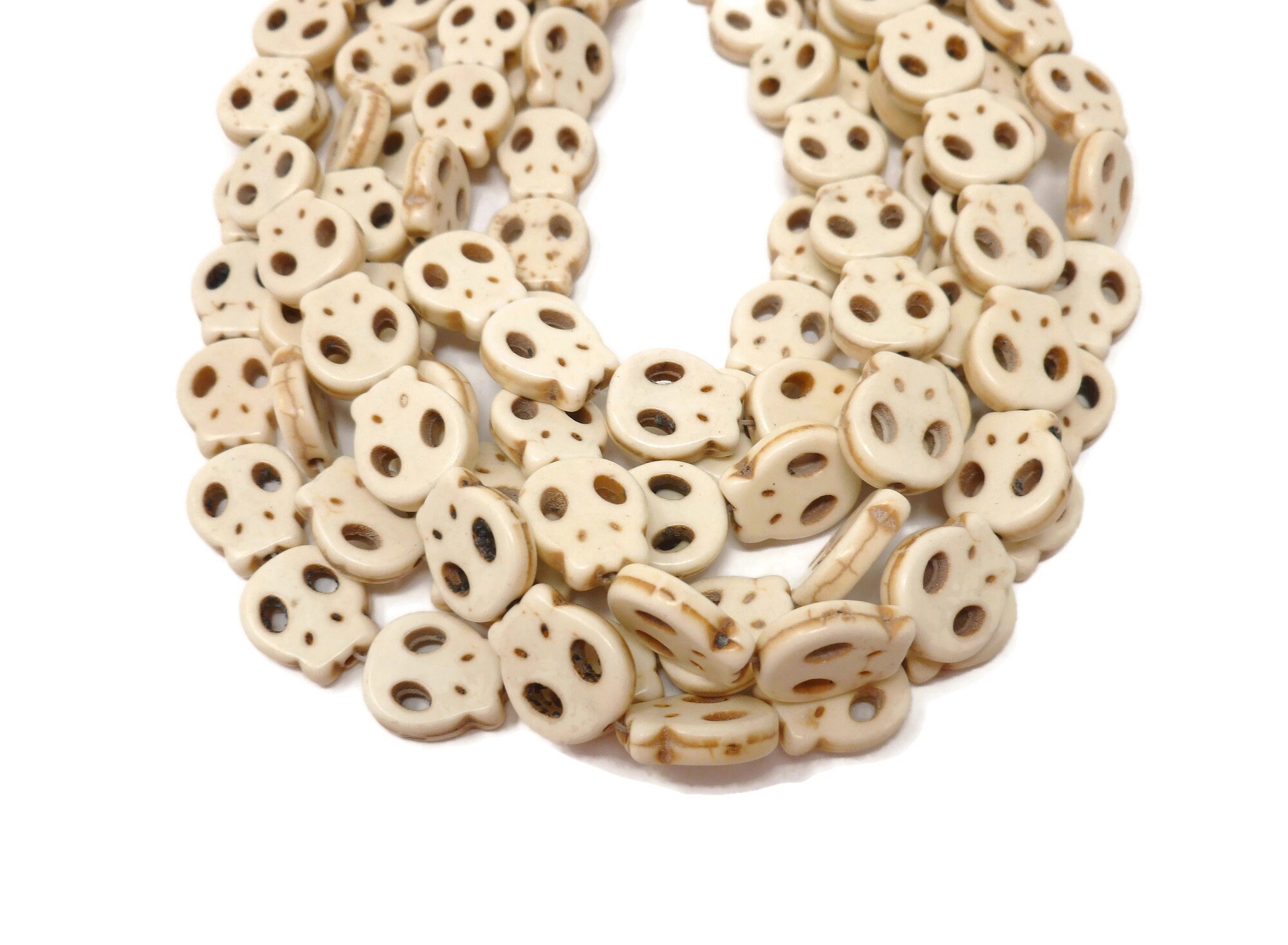 flat skull beads