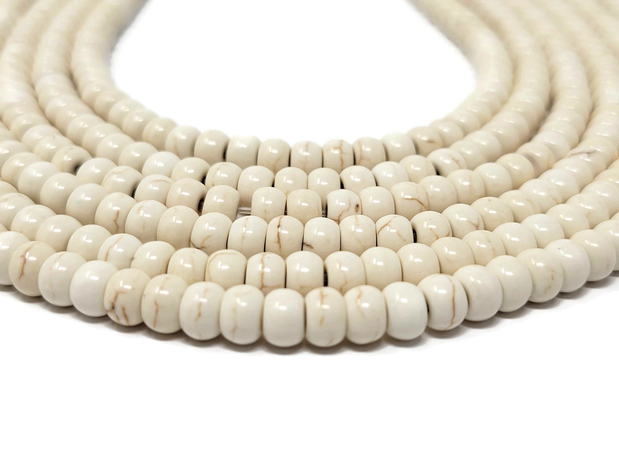 NATURAL SAUCER BONE BEAD