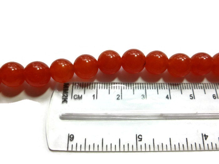 Red Orange Jade 10mm Round Bead 39 beads carnelian colored