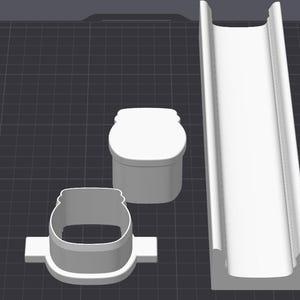May include: A set of three white 3D printed objects consisting of a jar-shaped cutter with side handles, a matching jar-shaped stamp or press, and a long, narrow rectangular tray with a deep, rounded channel running along its entire length.