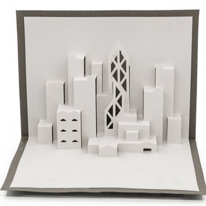 Biglietto pop-up con skyline 3D di Hong Kong: saluto urbano per gli appassionati di viaggi e architettura