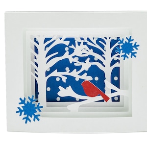 3D-vakantiewenskaart Winter Cardinal: feestelijke pop-up schaduwdoos met berken en besneeuwde scène voor kerst