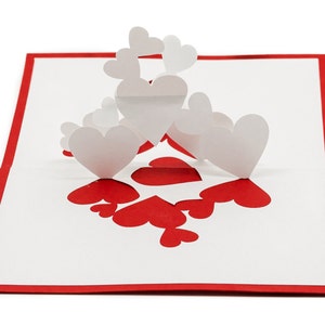 Tarjeta romántica 3D emergente con campo de corazones: saludo de amor hecho a mano para aniversarios, día de San Valentín y "Te amo"