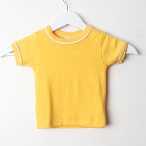 vintage 1950s 60s RINGER yellow and white t-shirt -- size 2t