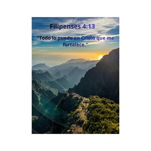 May include: A scenic landscape photograph featuring a mountain range under a blue sky with text that reads "Filipenses 4:13" and a quote in Spanish. The image captures a sunrise over the mountains, with lush green vegetation.