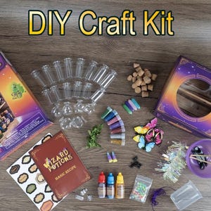May include: A DIY Craft Kit with various components for crafting. Includes small glass bottles, glitter, colorful liquids, a recipe book, stickers, and decorative items. The kit is designed for ages 6 and up.