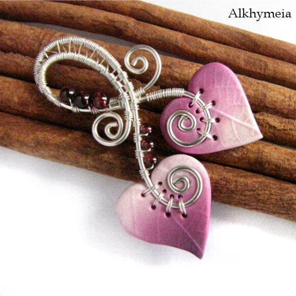 Single Entity, when love grows on trees: a polymer clay and wire wrapped pendant with garnet beads