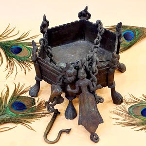 May include: A set of three ceramic mugs with a speckled, matte finish. The mugs are in shades of cream, light gray, and dark gray. Each mug has a simple, minimalist design, perfect for coffee or tea.